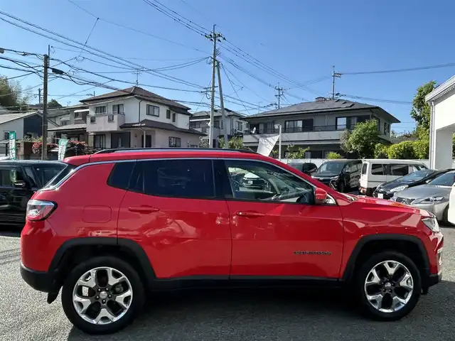 クライスラー・ジープ ジープ コンパス リミテッド 熊本県 2018(平30)年 5.6万km 赤 Beatsサウンド/4WD/純正メモリナビ/【ワンセグTV/CD/DVD/USB/Bluetooth】/バックカメラ/パーキングアシスト/レーダークルーズコントロール/レーンキープアシスト/コーナーセンサー/本革シート/パワーシート(D席)/前席シートヒーター/純正18インチアルミホイール/オートライト/オートマチックハイビーム/ダブル＋サイドエアバック/純正フロアマット/ビルトインETC/ドライブレコーダー/横滑り防止装置/盗難防止装置