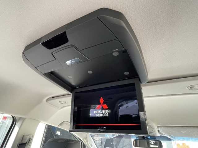 三菱 デリカＤ：５ シャモニー 栃木県 2025(令7)年 0.1千km 白Ⅱ AIS検査済み/【2506028454】/純正アルパインナビ/12.8型フリップダウンモニター/フルセグ/全方位カメラ/ステアリングリモコン/両側パワースライドドア/パワーバックドア/ステアリングヒーター/レーダークルーズ/前席シートヒーター/ハーフレザーシート/パドルシフト/ブラインドスポットモニター/アイドリングストップ/ウィンカーミラー/運転席パワーシート/AC100V電源/スマートキー/ナイトロパワー　M7ファランクス（社外）/TOYOオープンカントリーR/T　（社外）/Bratオリジナルリフトアップキット（社外）/MADLYS　フロントグリル（社外）/MADLYS　ブルバー（社外）/MADLYS　フェンダープロテクター（社外）/ヘッドライトシャドウシート（社外）/ルーフラック（社外）/社外パーツ取付有