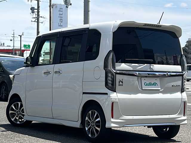 ホンダ Ｎ ＢＯＸ カスタム L 岐阜県 2021(令3)年 2.5万km プラチナホワイトパール /純正メモリナビ(VXM-194VFi)/(フルセグTV/BT/DVD/DISC/FM/AM/USB/SD)//ホンダセンシング/(アダプティブクルーズコントロール)/(車線維持支援システム)/(衝突軽減ブレーキ)/(誤発進抑制機能)/(後方誤発進抑制機能)/(歩行者事故低減ステアリング)/(路外逸脱抑制機能)/(先行車発進お知らせ機能)/(標識認識機能)/(オートハイビーム)//ビルトインETC//両側パワースライドドア//シートヒーター//2.5AUSBジャック(充電専用)×2//スペアキー×1//後方視角支援ミラー//純正フロアマット//保証書//取説