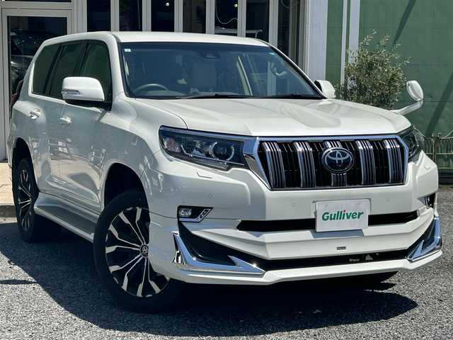 トヨタ ランドクルーザー プラド TX 埼玉県 2019(平31)年 3.6万km ホワイトパールクリスタルシャイン ワンオーナー車/モデリスタエアロ/社外20インチアルミ/（純正AW＋夏タイヤ車載）/社外ナビTV/アルパインフリップダウンモニター/バックカメラ/LEDヘッドライト/衝突軽減ブレーキ/レーダークルーズコントロール/プッシュスタート/スマートキー/保証書付整備手帳/取扱説明書