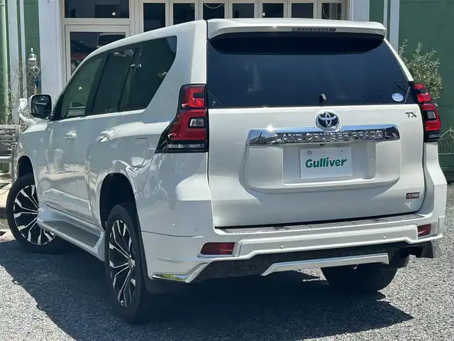 トヨタ ランドクルーザー プラド TX 埼玉県 2019(平31)年 3.6万km ホワイトパールクリスタルシャイン ワンオーナー車/モデリスタエアロ/社外20インチアルミ/（純正AW＋夏タイヤ車載）/社外ナビTV/アルパインフリップダウンモニター/バックカメラ/LEDヘッドライト/衝突軽減ブレーキ/レーダークルーズコントロール/プッシュスタート/スマートキー/保証書付整備手帳/取扱説明書