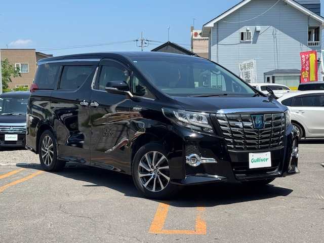 トヨタ アルファードハイブリット SR 道東・釧路十勝 2015(平27)年 9.6万km ブラック 4WD/純正メモリーナビ/　　（DVD/CD/フルセグTV/Bluetooth）/バックカメラ/純正フリップダウンモニター/衝突軽減ブレーキ/レーダークルーズコントロール/パワーバックドア/前席パワーシート/両側パワースライドドア/ハーフレザーシート/ウッドコンビハンドル/ステアリングリモコン/横滑り防止装置/LEDヘッドライト/フォグライト/ウィンカーミラー/電動格納ミラー/オットマンシート（助手席/2列目）/ドライブレコーダー/ビルトインETC/JBLサウンドシステム/ドアバイザー/純正フロアマット/スマートキー/エンジンプッシュスタート/スペアキー/取扱説明書/保証書/ナビ取説/純正17インチアルミホイール/冬タイヤ積み込み/　　（215/65R16、３mm、社外AW）