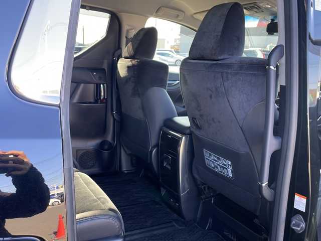 トヨタ アルファードハイブリット SR 道東・釧路十勝 2015(平27)年 9.6万km ブラック ・4WD/・純正9インチメモリナビ/（DVD・CD・フルセグ・Bluetooth・ラジオ・SD）/・バックカメラ/・純正10インチフリップダウンモニター/・JBLサウンドシステム/・衝突軽減ブレーキ/・レーダークルーズコントロール/・パワーバックドア/・前席パワーシート/・両側パワースライドドア/・ハーフレザーシート/・ウッドコンビハンドル/・ステアリングリモコン/・横滑り防止装置/・HIDヘッドライト/・フォグライト/・ウィンカーミラー/・電動格納ミラー/・オットマンシート（助手席/2列目）/・ドライブレコーダー/・ビルトインETC/・ドアバイザー/・純正フロアマット/・スマートキー/・エンジンプッシュスタート/・純正17インチアルミホイール