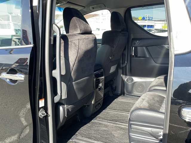 トヨタ アルファードハイブリット SR 道東・釧路十勝 2015(平27)年 9.6万km ブラック ・4WD/・純正9インチメモリナビ/（DVD・CD・フルセグ・Bluetooth・ラジオ・SD）/・バックカメラ/・純正10インチフリップダウンモニター/・JBLサウンドシステム/・衝突軽減ブレーキ/・レーダークルーズコントロール/・パワーバックドア/・前席パワーシート/・両側パワースライドドア/・ハーフレザーシート/・ウッドコンビハンドル/・ステアリングリモコン/・横滑り防止装置/・HIDヘッドライト/・フォグライト/・ウィンカーミラー/・電動格納ミラー/・オットマンシート（助手席/2列目）/・ドライブレコーダー/・ビルトインETC/・ドアバイザー/・純正フロアマット/・スマートキー/・エンジンプッシュスタート/・純正17インチアルミホイール