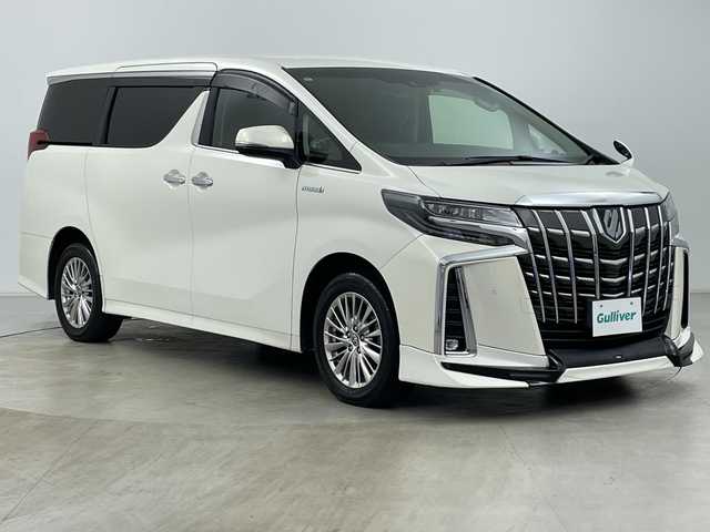 トヨタ アルファードハイブリット SR 道央・札幌 2019(令1)年 5.9万km ラグジュアリーホワイトパールクリスタルシャインガラスフレーク ・4WD/・純正ナビ&CD&DVD&BT&TV&SD/・両側パワースライドドア/・バックカメラ/・フリップダウンモニター/・トヨタセーフティセンス/・レーダークルーズコントロール/・クリアランスソナー/・前席パワーシート/・D席メモリシート/・前席エアシート/・レザーシート/・純正ドライブレコーダー/・ビルトイン2.0/・AC100V/・ステアリングスイッチ/・TRDフロントエアロ/・LEDヘッドライト/・オートライト/・オートマチックハイビーム/・スマートキー