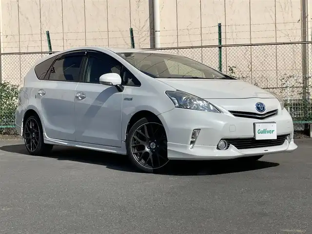 トヨタ プリウス α S チューンブラック 東京都 2014(平26)年 8.2万km ホワイトパールクリスタルシャイン トヨタ純正ナビ /＜TV/AMFM/BT/CD/DVD/SD＞/バックカメラ/ETC/EV/ECOモード/PWR/パーキングブレーキボタン/オートライト/エンジンスタートボタン/スマートキー/ステアリングスイッチ/純正フロアマット/社外アルミホイール/SRSエアバッグ（運転席/助手席/カーテン）