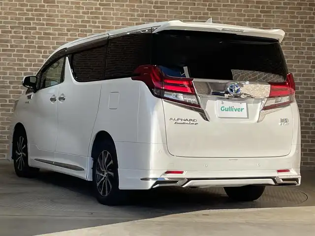 トヨタ アルファードハイブリット エグゼクティブ ラウンジ 岩手県 2015(平27)年 4.3万km ホワイトパールクリスタルシャイン ワンオーナー/４WD/JBLプレミアムサウンドシステム/モデリスタエアロ/サンルーフ/両側パワースライドドア/パワーバックドア/後席モニター/後席エアコン/100Ｖ電源/MTモード付AT/プリクラッシュセーフティ/クリアランスソナー/全周囲カメラ/横滑り防止装置/オートライト/オートハイビーム/アイドリングストップ/パワーシート/シートヒーター/エアシート/ステアリングヒーター/オールオートパワーウィンドウ/ステアリングスイッチ