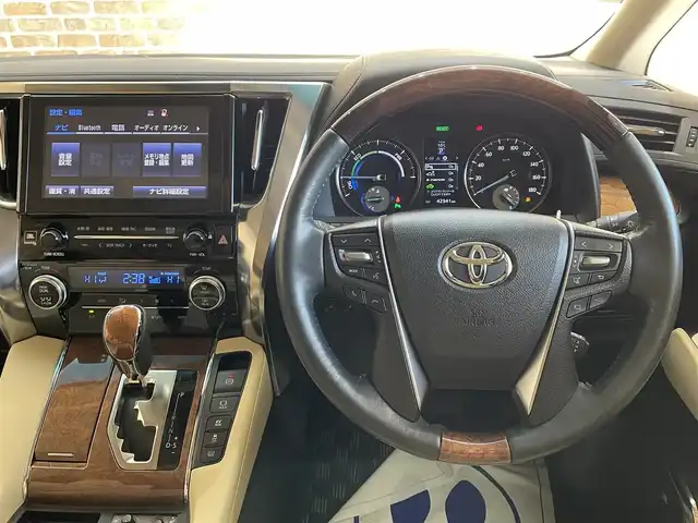 トヨタ アルファードハイブリット エグゼクティブ ラウンジ 岩手県 2015(平27)年 4.3万km ホワイトパールクリスタルシャイン ワンオーナー/４WD/JBLプレミアムサウンドシステム/モデリスタエアロ/サンルーフ/両側パワースライドドア/パワーバックドア/後席モニター/後席エアコン/100Ｖ電源/MTモード付AT/プリクラッシュセーフティ/クリアランスソナー/全周囲カメラ/横滑り防止装置/オートライト/オートハイビーム/アイドリングストップ/パワーシート/シートヒーター/エアシート/ステアリングヒーター/オールオートパワーウィンドウ/ステアリングスイッチ