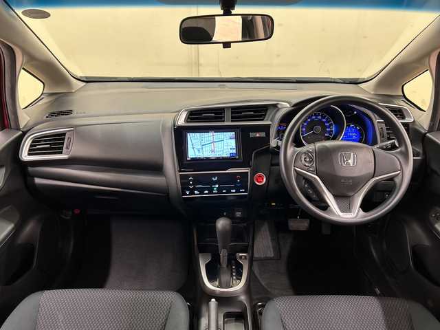ホンダ フィット 13G F 道央・札幌 2018(平30)年 7.7万km プレミアムクリスタルレッドM ４WD//社外ナビ/　CD/BT/USB/ワンセグTV//バックカメラ//エンジンスターター//プッシュスタート//スマートキー//スペアキー//アイドリングストップ//ETC//社外15インチアルミ//冬タイヤ付き//電動格納ミラー