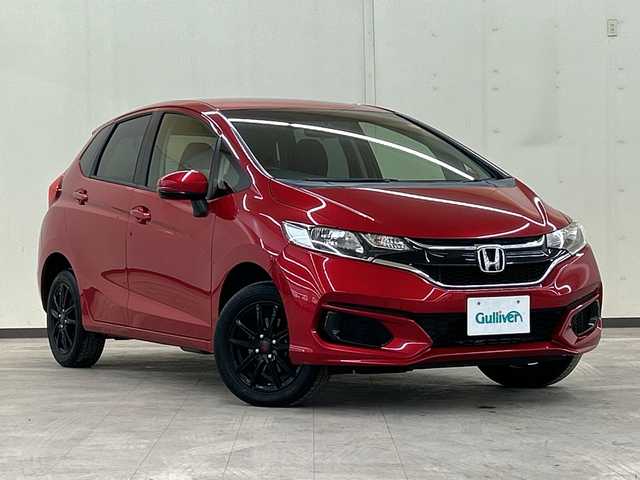 ホンダ フィット 13G F 道央・札幌 2018(平30)年 7.7万km プレミアムクリスタルレッドM ４WD//社外ナビ/　CD/BT/USB/ワンセグTV//バックカメラ//エンジンスターター//プッシュスタート//スマートキー//スペアキー//アイドリングストップ//ETC//社外15インチアルミ//冬タイヤ付き//電動格納ミラー