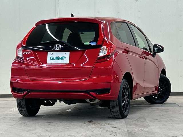 ホンダ フィット 13G F 道央・札幌 2018(平30)年 7.7万km プレミアムクリスタルレッドM ４WD//社外ナビ/　CD/BT/USB/ワンセグTV//バックカメラ//エンジンスターター//プッシュスタート//スマートキー//スペアキー//アイドリングストップ//ETC//社外15インチアルミ//冬タイヤ付き//電動格納ミラー