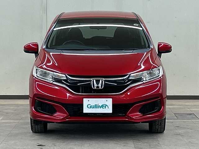 ホンダ フィット 13G F 道央・札幌 2018(平30)年 7.7万km プレミアムクリスタルレッドM ４WD//社外ナビ/　CD/BT/USB/ワンセグTV//バックカメラ//エンジンスターター//プッシュスタート//スマートキー//スペアキー//アイドリングストップ//ETC//社外15インチアルミ//冬タイヤ付き//電動格納ミラー