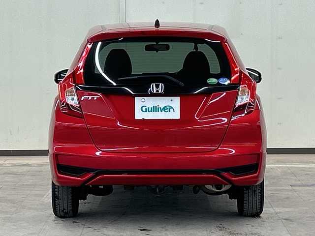 ホンダ フィット 13G F 道央・札幌 2018(平30)年 7.7万km プレミアムクリスタルレッドM ４WD//社外ナビ/　CD/BT/USB/ワンセグTV//バックカメラ//エンジンスターター//プッシュスタート//スマートキー//スペアキー//アイドリングストップ//ETC//社外15インチアルミ//冬タイヤ付き//電動格納ミラー