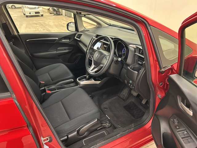 ホンダ フィット 13G F 道央・札幌 2018(平30)年 7.7万km プレミアムクリスタルレッドM ４WD//社外ナビ/　CD/BT/USB/ワンセグTV//バックカメラ//エンジンスターター//プッシュスタート//スマートキー//スペアキー//アイドリングストップ//ETC//社外15インチアルミ//冬タイヤ付き//電動格納ミラー