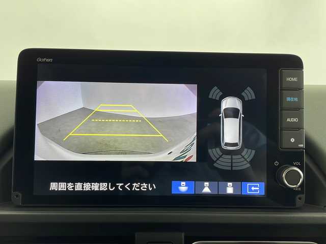 ホンダ フリード ハイブリット e:HEV クロスター 鹿児島県 2025(令7)年 0.1万km未満 プラチナホワイトパール 登録済未使用車/純正9インチナビ/（BT/フルセグTV）/両側パワースライドドア/レーダークルーズコントロール/ホンダセンシング/電動パーキングブレーキ/オートホールド機能/リアサーキュレーター/リアサンシェード/ハーフレザーシート/シートヒーター/バックカメラ/純正アルミホイール/保証書、取説