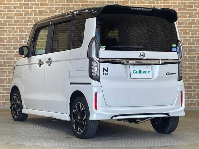 ホンダ Ｎ ＢＯＸ カスタム G L ターボ ホンダセンシング 岩手県 2020(令2)年 8.3万km プラチナホワイトパール 4WD/純正メモリナビ/FM/AM/CD/DVD/Bluetooth/フルセグTV/ホンダセンシング/レーンキープアシスト/横滑り防止/バックカメラ/前後ドライブレコーダー/レーダークルーズコントロール/オートライト/LEDヘッドライト/フォグランプ/ハーフレザーシート/シートヒーター/両側パワースライドドア/純正アルミホイール/純正フロアマット/プッシュスタート/スマートキー