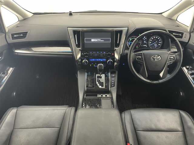 トヨタ ヴェルファイア ハイブリット ZR Gエディション 愛知県 2019(平31)年 6.2万km ホワイトパールクリスタルシャイン 純９型ナビ　フルセグＴＶ　全方位カメラ　ＪＢＬサウンド　デジタルインナーミラー　純１２型後席モニター　パワーバックドア　両側電動スライドドア　温・冷シート　黒革　３眼ＬＥＤオートライト　ＢＳＭ　禁煙車/ETC２．０　ドラレコ　1・2列目シートヒーター　オートハイビーム　追従クルコン　衝突軽減　メモリ付きパワーシート　オットマン　Bluetooth　HDMI端子　後席エアコン