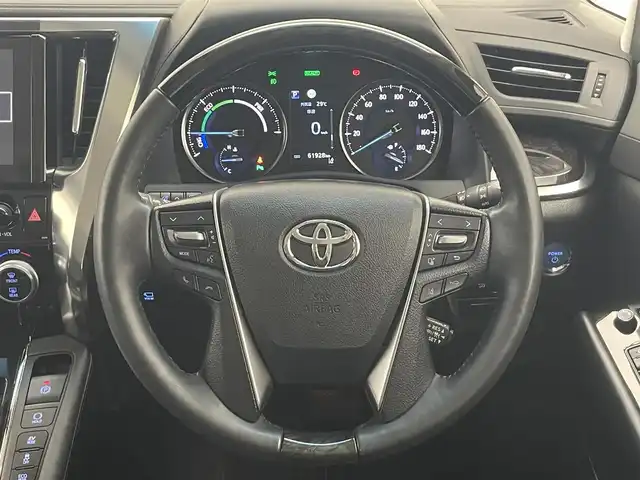 トヨタ ヴェルファイア ハイブリット ZR Gエディション 愛知県 2019(平31)年 6.2万km ホワイトパールクリスタルシャイン 純９型ナビ　フルセグＴＶ　全方位カメラ　ＪＢＬサウンド　デジタルインナーミラー　純１２型後席モニター　パワーバックドア　両側電動スライドドア　温・冷シート　黒革　３眼ＬＥＤオートライト　ＢＳＭ　禁煙車/ETC２．０　ドラレコ　1・2列目シートヒーター　オートハイビーム　追従クルコン　衝突軽減　メモリ付きパワーシート　オットマン　Bluetooth　HDMI端子　後席エアコン