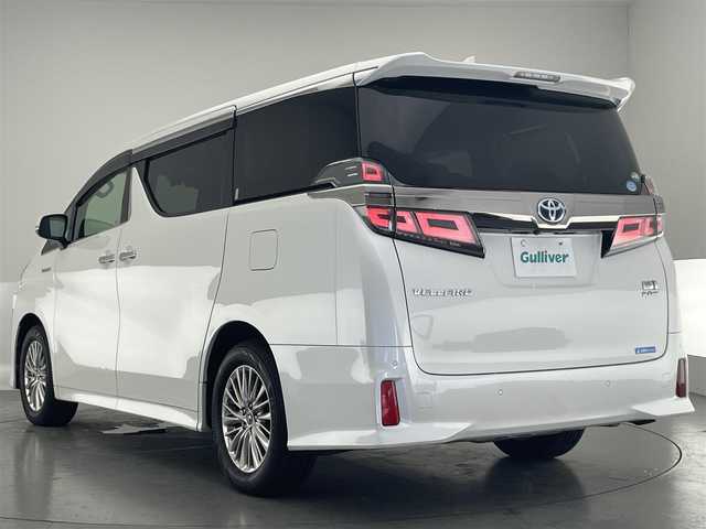 トヨタ ヴェルファイア ハイブリット ZR Gエディション 愛知県 2019(平31)年 6.2万km ホワイトパールクリスタルシャイン 純９型ナビ　フルセグＴＶ　全方位カメラ　ＪＢＬサウンド　デジタルインナーミラー　純１２型後席モニター　パワーバックドア　両側電動スライドドア　温・冷シート　黒革　３眼ＬＥＤオートライト　ＢＳＭ　禁煙車/ETC２．０　ドラレコ　1・2列目シートヒーター　オートハイビーム　追従クルコン　衝突軽減　メモリ付きパワーシート　オットマン　Bluetooth　HDMI端子　後席エアコン