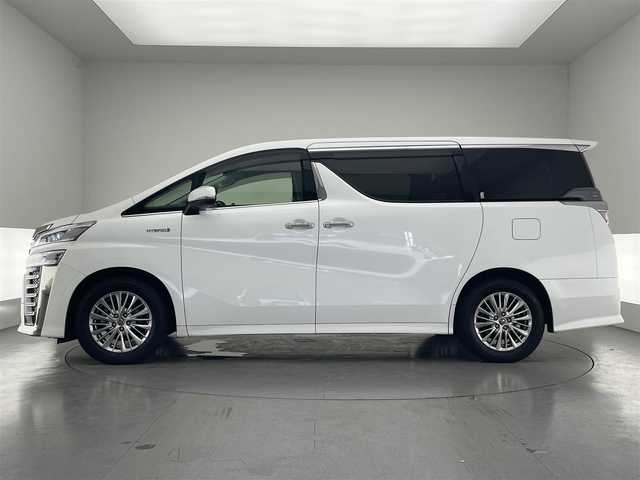 トヨタ ヴェルファイア ハイブリット ZR Gエディション 愛知県 2019(平31)年 6.2万km ホワイトパールクリスタルシャイン 純９型ナビ　フルセグＴＶ　全方位カメラ　ＪＢＬサウンド　デジタルインナーミラー　純１２型後席モニター　パワーバックドア　両側電動スライドドア　温・冷シート　黒革　３眼ＬＥＤオートライト　ＢＳＭ　禁煙車/ETC２．０　ドラレコ　1・2列目シートヒーター　オートハイビーム　追従クルコン　衝突軽減　メモリ付きパワーシート　オットマン　Bluetooth　HDMI端子　後席エアコン