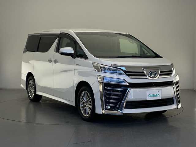 トヨタ ヴェルファイア ハイブリット ZR Gエディション 長野県 2019(平31)年 6.2万km ホワイトパールクリスタルシャイン 純９型ナビ　フルセグＴＶ　全方位カメラ　ＪＢＬサウンド　デジタルインナーミラー　純１２型後席モニター　パワーバックドア　両側電動スライドドア　温・冷シート　黒革　３眼ＬＥＤオートライト　ＢＳＭ　禁煙車/ETC２．０　ドラレコ　1・2列目シートヒーター　オートハイビーム　追従クルコン　衝突軽減　メモリ付きパワーシート　オットマン　Bluetooth　HDMI端子　後席エアコン