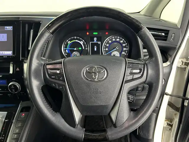 トヨタ アルファードハイブリット SR 道央・札幌 2015(平27)年 6万km ホワイトパールクリスタルシャイン ・4WD/・純正9インチナビ/・フルセグ/BT/CD/DVD/・両側パワースライドドア/・パワーシート/・シートメモリ/・クルーズコントロール/・社外ドライブレコーダー前後/・オートブレーキホールド/・ドアロック連動ミラー/・コーナーセンサー/・プッシュスタート/・スマートキー/・LEDヘッドライト/・オートライト/・オートエアコン/・横滑り防止装置