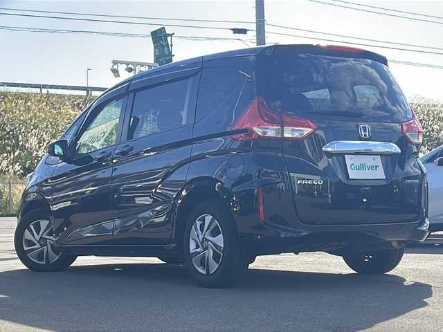 ホンダ フリード ハイブリット G ホンダセンシング 青森県 2020(令2)年 6.1万km クリスタルブラックパール ・純正メーカーOPナビ/・フルセグTV/BT/CD/DVD/AM/FM/・バックカメラ/・両側パワースライドドア/・衝突軽減/・レーンキープアシスト/・レーダークルーズコントロール/・後方コーナーセンサー/・ワイパーデアイサ/・D＋N席シートヒーター/・純正ドライブレコーダー/・純正ETC/・後席サンシェード/・純正フロアマット/・ドアバイザー