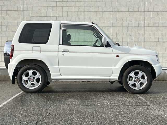 三菱 パジェロ ミニ VR 富山県 2007(平19)年 4.2万km ホワイト 4WD/フォグランプ/純正オーディオ/純正フロアマット/電動格納ミラー/純正アルミホイール/背面タイヤ/ルーフレール積込