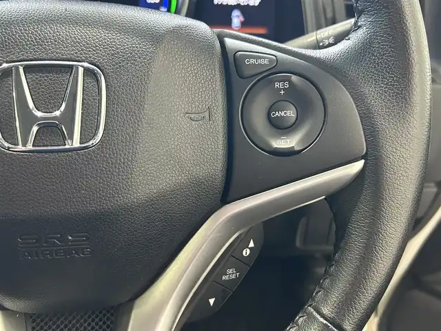 ホンダ フィット ハイブリット Lパッケージ 沖縄県 2014(平26)年 6.5万km プレミアムホワイトパール (株)IDOMが運営する【じしゃロンコザ店】の自社ローン専用車両になりますこちらは現金またはオートローンご利用時の価格です。自社ローンご希望の方は別途その旨お申付け下さい/フルセグＴＶ　/ＥＴＣ　/純正ナビ　/ＤＶＤ再生　/バックカメラ　/ドライブレコーダー　/プッシュスタート/ハーフレザーシート　/クルーズコントロール/純正アルミホイール　/オートライト　/Ｂｌｕｅｔｏｏｔｈ接続