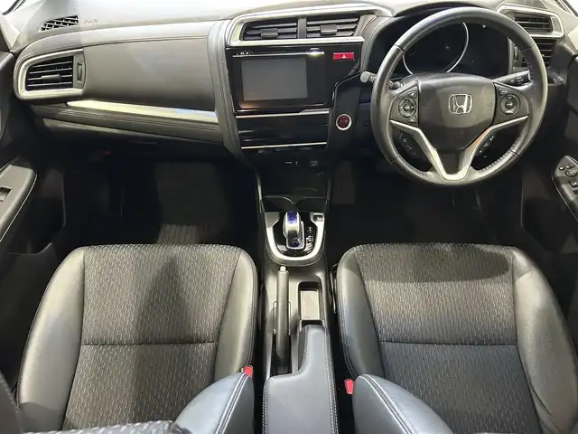 ホンダ フィット ハイブリット Lパッケージ 沖縄県 2014(平26)年 6.5万km プレミアムホワイトパール (株)IDOMが運営する【じしゃロンコザ店】の自社ローン専用車両になりますこちらは現金またはオートローンご利用時の価格です。自社ローンご希望の方は別途その旨お申付け下さい/フルセグＴＶ　/ＥＴＣ　/純正ナビ　/ＤＶＤ再生　/バックカメラ　/ドライブレコーダー　/プッシュスタート/ハーフレザーシート　/クルーズコントロール/純正アルミホイール　/オートライト　/Ｂｌｕｅｔｏｏｔｈ接続