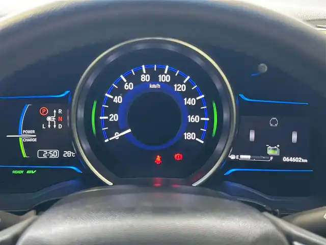 ホンダ フィット ハイブリット Lパッケージ 沖縄県 2014(平26)年 6.5万km プレミアムホワイトパール (株)IDOMが運営する【じしゃロンコザ店】の自社ローン専用車両になりますこちらは現金またはオートローンご利用時の価格です。自社ローンご希望の方は別途その旨お申付け下さい/フルセグＴＶ　/ＥＴＣ　/純正ナビ　/ＤＶＤ再生　/バックカメラ　/ドライブレコーダー　/プッシュスタート/ハーフレザーシート　/クルーズコントロール/純正アルミホイール　/オートライト　/Ｂｌｕｅｔｏｏｔｈ接続