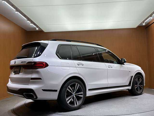 ＢＭＷ Ｘ７ xDrive35d Mスポーツ 千葉県 2019(令1)年 4.8万km ミネラルホワイト ６人乗り　/スカイラウンジパノラマＳＲ　/白革シート　/ｈａｒｍａｎｋａｒｄｏｎ　/ＨＵＤ　/ＡＣＣ　/ナビ　/ＴＶ　/３６０°　/Ｂｌｕｅｔｏｏｔｈ接続　/パーキングアシスト　/アッシュグレインシルバーウッドトリム
