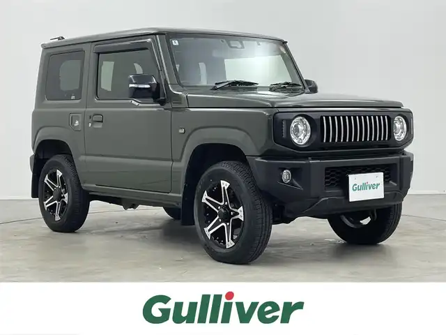 スズキ ジムニー XC 埼玉県 2022(令4)年 3.4万km ジャングルグリーン 5速MT/社外7インチナビ/ フルセグTV Bluetooth CD DVD/バックカメラ/クルーズコントロール/デュアルセンサーブレーキサポート2/ヒルディセントコントロール/ドライブレコーダー/ビルトインETC/前席シートヒーター/前席レーザーシートカバー/社外グリル/社外テールランプ/carrozzeriaスピーカー/社外16インチアルミホイール/LEDオートライト/オートエアコン