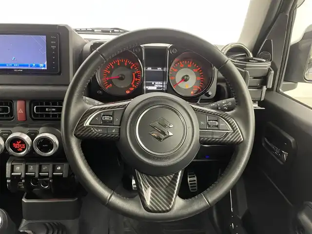 スズキ ジムニー XC 埼玉県 2022(令4)年 3.4万km ジャングルグリーン 5速MT/社外7インチナビ/ フルセグTV Bluetooth CD DVD/バックカメラ/クルーズコントロール/デュアルセンサーブレーキサポート2/ヒルディセントコントロール/ドライブレコーダー/ビルトインETC/前席シートヒーター/前席レーザーシートカバー/社外グリル/社外テールランプ/carrozzeriaスピーカー/社外16インチアルミホイール/LEDオートライト/オートエアコン