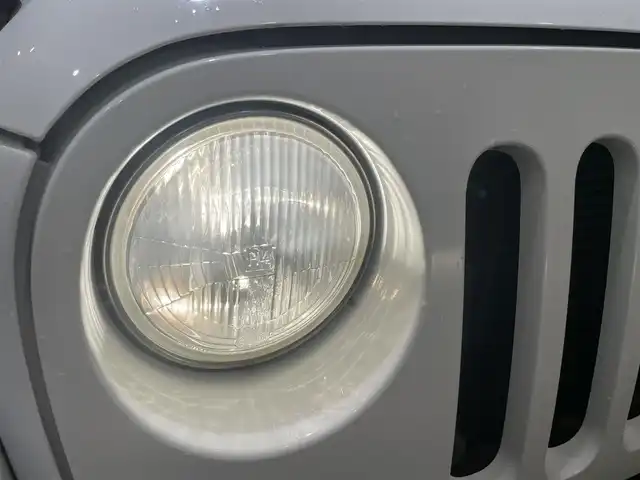 クライスラー・ジープ ジープ ラングラー アンリミテッド アルティテュード 愛知県 2012(平24)年 6万km 白 限定車　/レザーシート　/シートヒーター　/カロッツェリアナビ　/Ｂｌｕｅｔｏｏｔｈ　/ワンセグＴＶ　/サイドカメラ　/クルーズコントロール　/ＥＴＣ