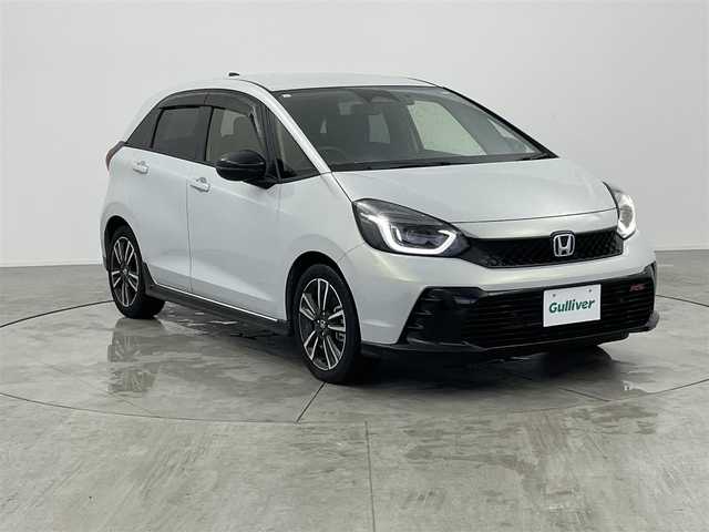 ホンダ フィット e:HEV RS 愛知県 2023(令5)年 2.1万km プレミアムサンライトホワイトパール ・純正8インチナビ/・バックカメラ/・Bluetooth/・フルセグTV/・ホンダセンシング/・衝突被害軽減システム/・クルーズコントロール/・レーンキープアシスト/・コーナーセンサー/・オートライト/・ドライブレコーダー/・ETC/・純正AW/・プッシュスタート/・スマートキー/・スペアキー