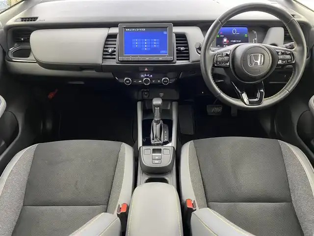 ホンダ フィット e:HEV RS 愛知県 2023(令5)年 2.1万km プレミアムサンライトホワイトパール ・純正8インチナビ/・バックカメラ/・Bluetooth/・フルセグTV/・ホンダセンシング/・衝突被害軽減システム/・クルーズコントロール/・レーンキープアシスト/・コーナーセンサー/・オートライト/・ドライブレコーダー/・ETC/・純正AW/・プッシュスタート/・スマートキー/・スペアキー