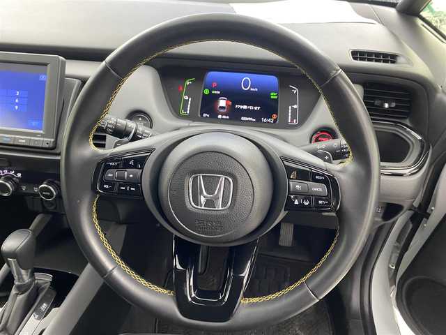 ホンダ フィット e:HEV RS 愛知県 2023(令5)年 2.1万km プレミアムサンライトホワイトパール ・純正8インチナビ/・バックカメラ/・Bluetooth/・フルセグTV/・ホンダセンシング/・衝突被害軽減システム/・クルーズコントロール/・レーンキープアシスト/・コーナーセンサー/・オートライト/・ドライブレコーダー/・ETC/・純正AW/・プッシュスタート/・スマートキー/・スペアキー