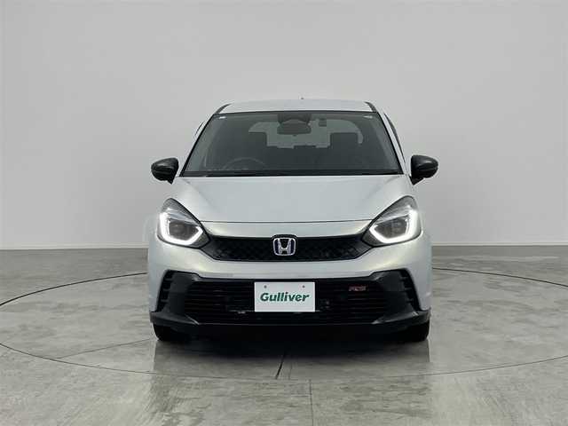ホンダ フィット e:HEV RS 愛知県 2023(令5)年 2.1万km プレミアムサンライトホワイトパール ・純正8インチナビ/・バックカメラ/・Bluetooth/・フルセグTV/・ホンダセンシング/・衝突被害軽減システム/・クルーズコントロール/・レーンキープアシスト/・コーナーセンサー/・オートライト/・ドライブレコーダー/・ETC/・純正AW/・プッシュスタート/・スマートキー/・スペアキー
