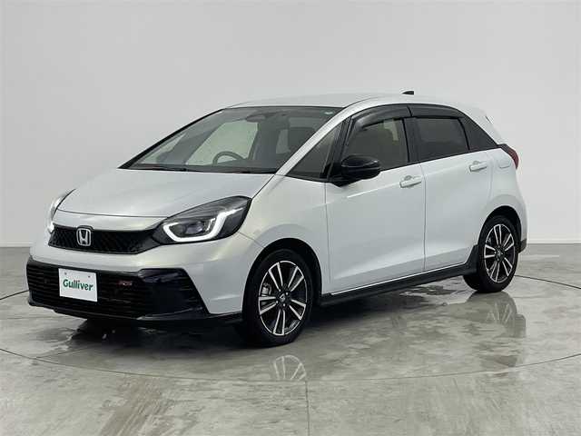 ホンダ フィット e:HEV RS 愛知県 2023(令5)年 2.1万km プレミアムサンライトホワイトパール ・純正8インチナビ/・バックカメラ/・Bluetooth/・フルセグTV/・ホンダセンシング/・衝突被害軽減システム/・クルーズコントロール/・レーンキープアシスト/・コーナーセンサー/・オートライト/・ドライブレコーダー/・ETC/・純正AW/・プッシュスタート/・スマートキー/・スペアキー