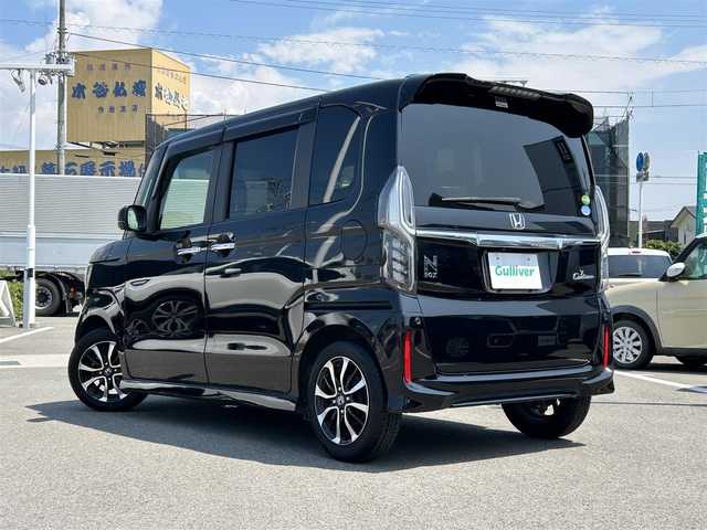 ホンダ Ｎ ＢＯＸ カスタム G L ホンダセンシング 愛媛県 2019(平31)年 8万km クリスタルブラックパール 禁煙車/登録時走行距離:79467km/社外メモリナビ/AM/FM/CD/DVD/フルセグTV/SD/Bluetooth/バックカメラ/前後ドライブレコーダー/ビルトインETC/衝突軽減システム/横滑り防止装置/レーダークルーズコントロール/LEDヘッドライト/オートライト/片側パワースライドドア/エンジンスタートボタン/スマートキー/純正アルミホイール/コーナーセンサー