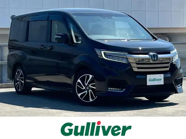 ホンダ ステップワゴン スパーダ クルスピセンシング 静岡県 2021(令3)年 6.5万km プレミアムスパークルブラックパール ホンダセンシング/純正１０型インターナビ/フルセグTV/ＤＶＤ再生/純正後席モニター/バックカメラ/ＥＴＣ/ドラレコ前後/前席シートヒーター/ＡＣＣ/誤発進抑制機能/わくわくゲート/ＬＥＤヘッドライト/LEDフォグライト/サイドカーテンエアバッグ/純正１７ＡＷ