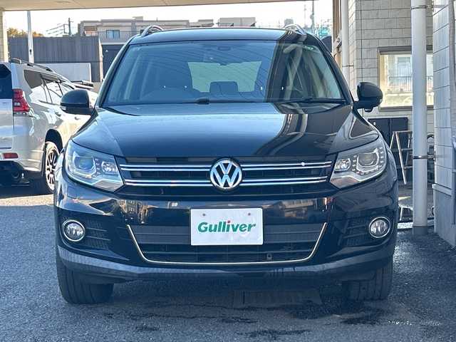 フォルクスワーゲン ティグアン TSI Bモーションテクノロジー 神奈川県 2013(平25)年 5万km ディープブラックパールエフェクト 純正ナビ/（CD/DVD/AM/FM/SD/USB/BT/ワンセグTV)/バックカメラ/前後ドライブレコーダー/ETC/クルーズコントロール/コーナーセンサー/横滑り防止装置/ABS/アイドリングストップ/オートライト/ISOFIX/ルーフレール/純正フロアマット/純正アルミホイール/スペアキー×２/保証書/取扱説明書