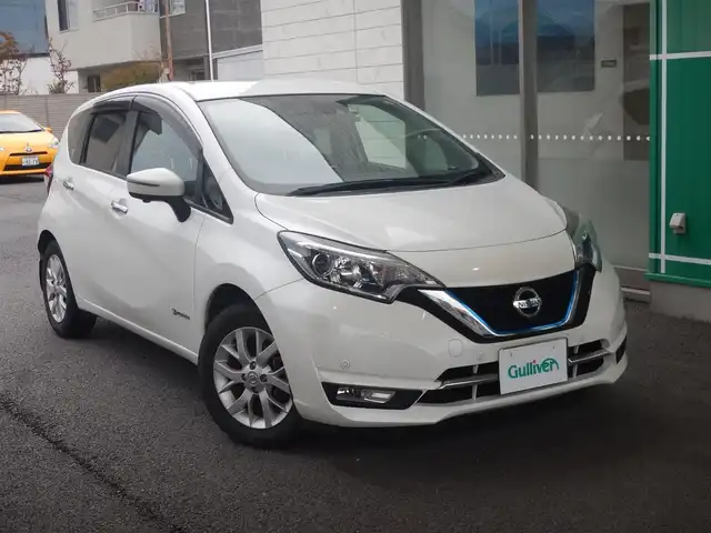 日産 ノート e－パワー メダリスト 静岡県 2017(平29)年 6.2万km ブリリアントホワイトパール エマージェンシーブレーキ/車線逸脱警報/純正ナビMM316D/フルセグ/BT接続/SD/アラウンドビューモニター/車線逸脱警報/前方ドライブレコーダー/社外ETC/ハーフレザーシート/ステアリングリモコン/インテリジェントキー×2/プッシュスタート/オートライト/フォグランプ/LEDヘッドライト/純正フロアマット/純正ドアバイザー/取説・保証書