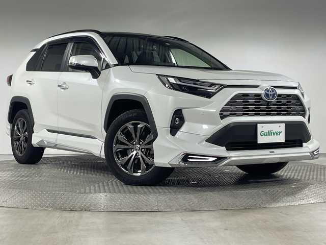 トヨタ ＲＡＶ４ ハイブリッドG 神奈川県 2022(令4)年 3.6万km プラチナホワイトパールマイカ トヨタセーフティセンス/純正10.5型ディスプレイオーディオ/・BT/フルセグTV/MiraCast/USB/HDMI/パノラミックビューモニター/ブラインドスポットモニター/パノラマムーンルーフ/モデリスタエアロキット/置くだけ充電/ビルトインETC2.0/パワーバックドア/レザー調シート/パワーシート(D)/メモリシート(D)/シートヒーター(D/N)/ベンチレーション(D/N)/革巻きステアリング/ステアリングスイッチ/ステアリングヒーター/Autoライト/ECO/SPORTモード/MTモード/スマートキー/スペアキー/プッシュスタートボタン/LEDヘッドライト/フォグランプ/自動防眩ミラー/コーナーセンサー/純正18インチアルミホイール/純正ドアバイザー/フロアマット