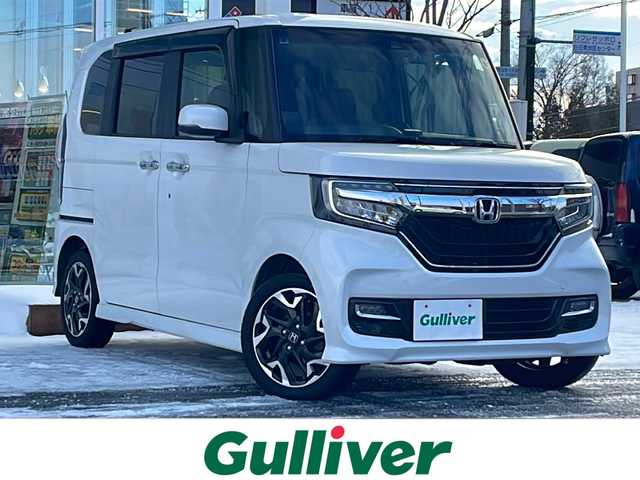 ホンダ Ｎ ＢＯＸ カスタム G L ターボ ホンダセンシング 道央・札幌 2019(令1)年 4.2万km プラチナホワイトパール ・４WD/・ホンダセンシング/・純正ナビ/　CD＆DVD＆BT＆TV/・バックカメラ/・両側パワースライドドア/・ハーフレザーシート/・純正エンジンスターター/・レーダークルーズコントロール/・コーナーセンサー/・レーンキープアシスト/・オートライト/・オートエアコン/・ミラーヒーター/・シートヒーター/・ターボ/・前後ドライブレコーダー/・純正AW＆冬タイヤ積込/・プッシュスタート/・スマートキー/・電動格納ミラー/・社外レーダー/・純正フロアマット/・ドアバイザー/・ウィンカーミラー/・フォグライト/・スペアキー