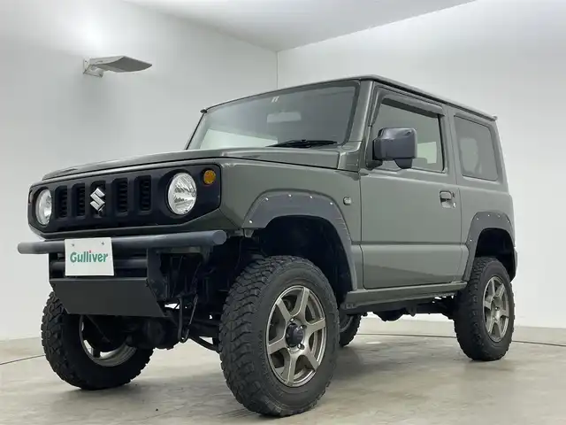 スズキ ジムニー XL 岡山県 2019(令1)年 3.9万km ジャングルグリーン ディスプレイオーディオ/Carplay/HDMI/Bluetooth/4WD/社外16inアルミホイール+サマータイヤ：装着/LEDヘッドライト/シートヒーター/横滑り防止機能/スマートキー/プッシュスタート/純正フロアマット/オーバーフェンダー