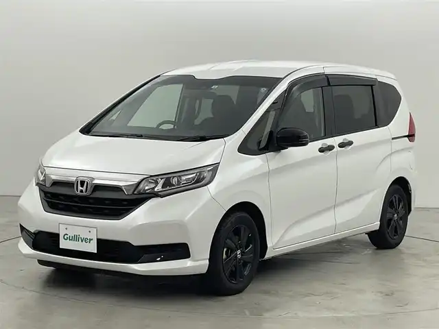 ホンダ フリード ハイブリット G ブラックスタイル 福岡県 2022(令4)年 3.2万km プラチナホワイトパール 純正ナビ　/バックカメラ　/ＥＴＣ　/前後ドラレコ　/ホンダセンシング　/アダプティブクルコン　/衝突被害軽減ブレーキ　/レーンキープ　/先行車発進お知らせ　/両側電動スライドドア　/シートヒーター　/純正１５インチＡＷ