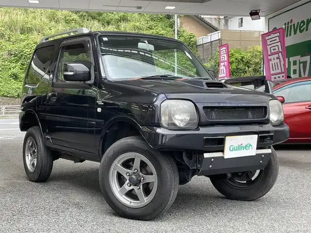 スズキ ジムニー ワイルドウィンド 神奈川県 2007(平19)年 12.2万km ブルーイッシュブラックパール3 KENWOODラジオ/ターボ/4WD/ルーフレール/運転席シートヒーター/ドアバイザー/社外フロアマット/純正16インチアルミホイール/純正ハロゲンヘッドライト/新車時保証書/取扱説明書