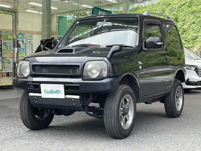スズキ ジムニー ワイルドウィンド 神奈川県 2007(平19)年 12.2万km ブルーイッシュブラックパール3 KENWOODラジオ/ターボ/4WD/ルーフレール/運転席シートヒーター/ドアバイザー/社外フロアマット/純正16インチアルミホイール/純正ハロゲンヘッドライト/新車時保証書/取扱説明書